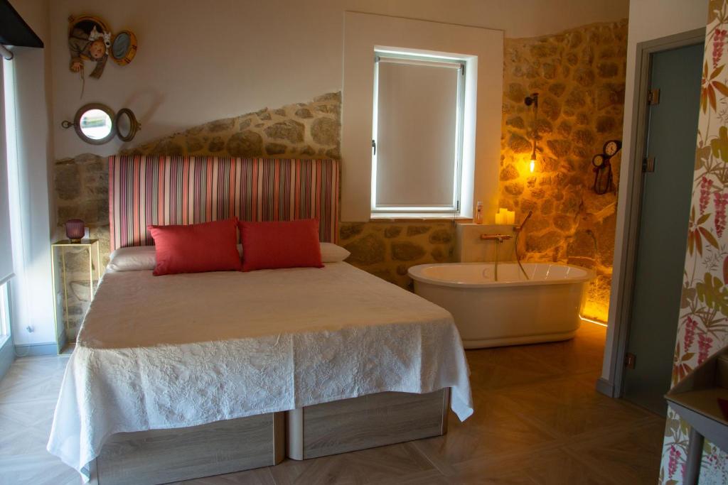 Postel nebo postele na pokoji v ubytování El Escondite del Agua