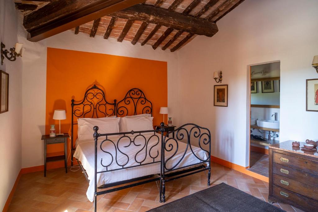 Postel nebo postele na pokoji v ubytování Castello del Calcione