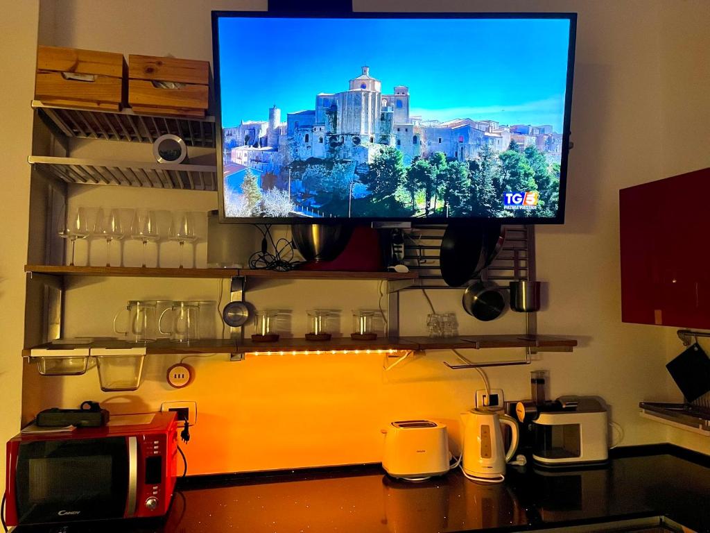 Telewizja i/lub zestaw kina domowego w obiekcie Casa Bolognese - in the heart of the city!