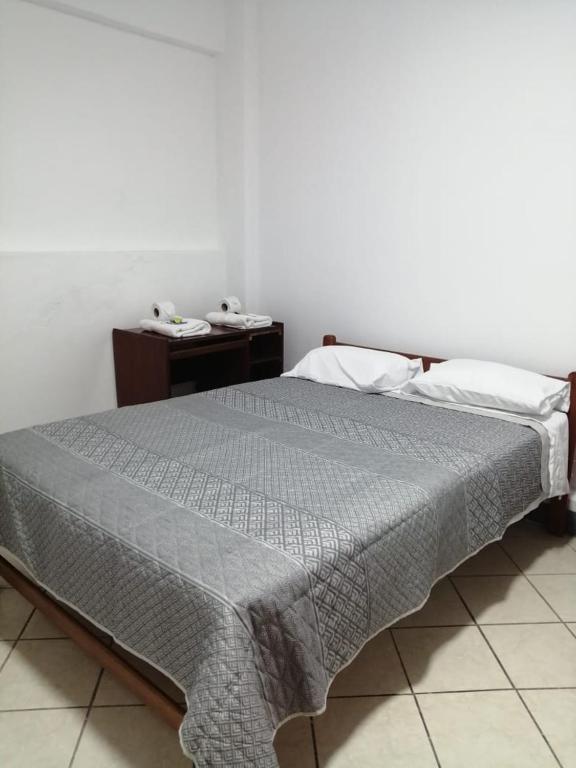 Postel nebo postele na pokoji v ubytování Hospedaje Margarita