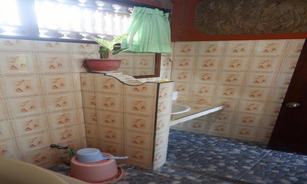 Koupelna v ubytování Danasari Homestay