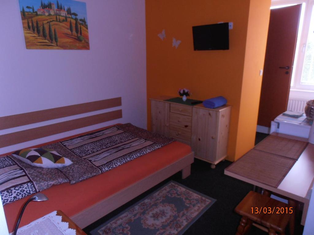 Postel nebo postele na pokoji v ubytování Zelený Dom