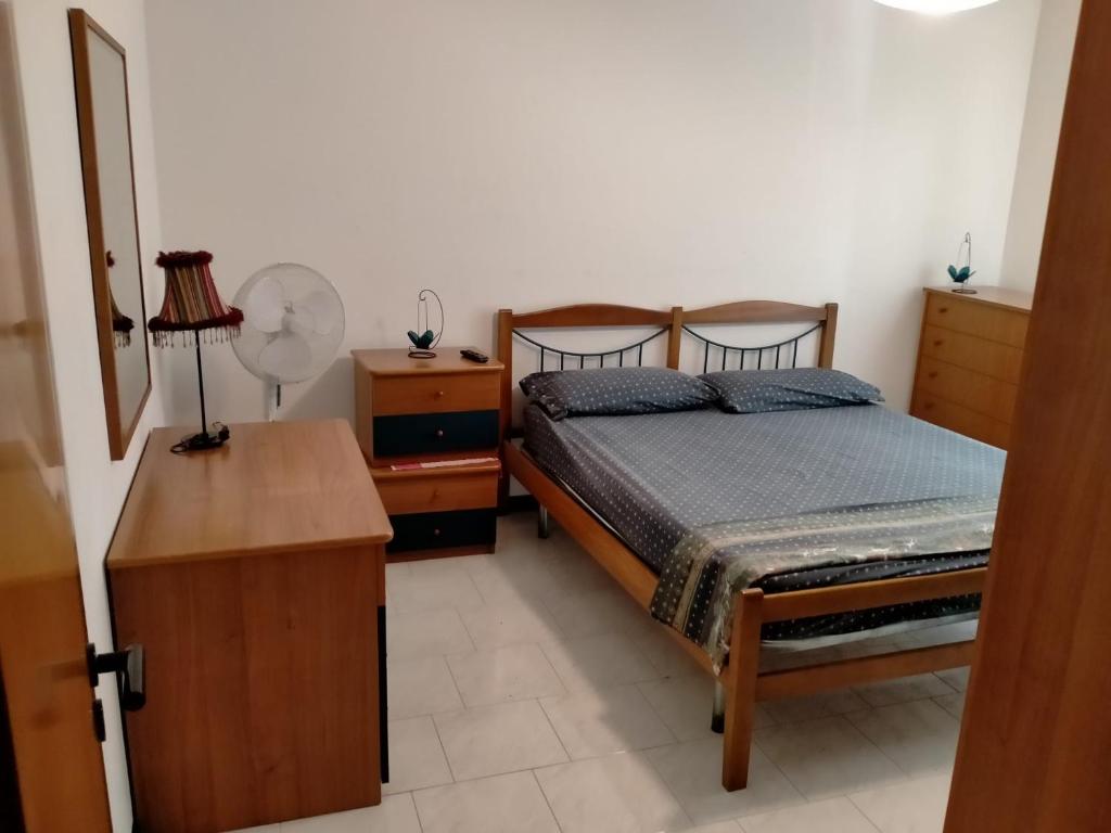 A bed or beds in a room at Casa Pavone