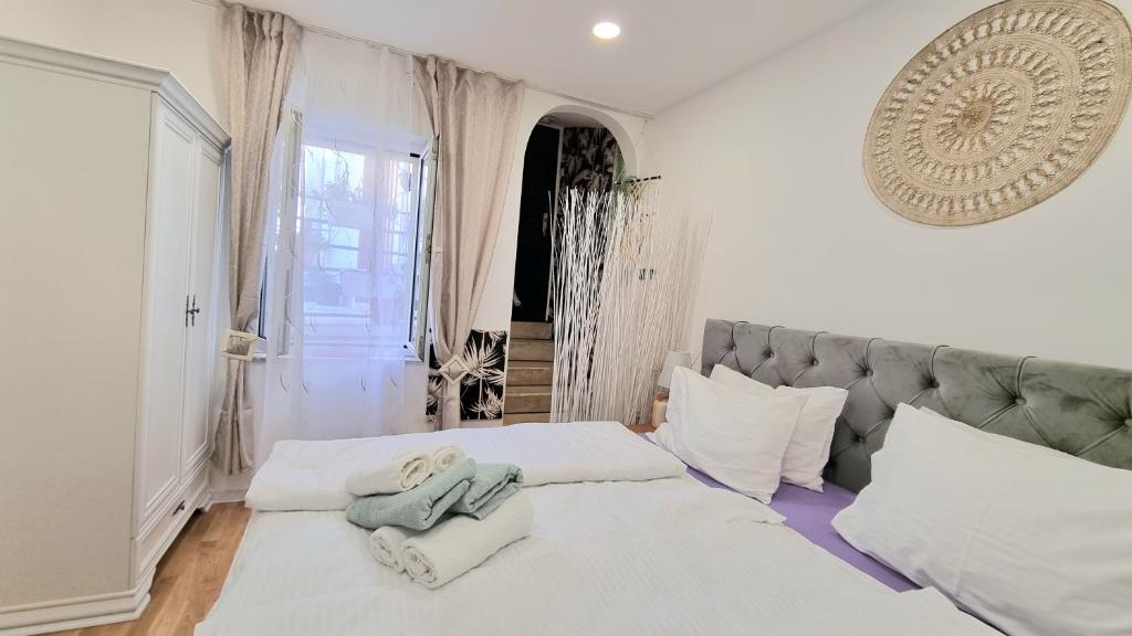 Posteľ alebo postele v izbe v ubytovaní PLACE 4 U Studio Center