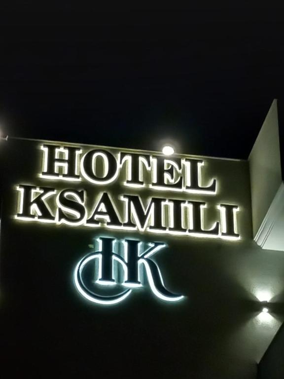 a neon sign for a honolulu kerkani restaurant at Hotel Ksamili in Ksamil