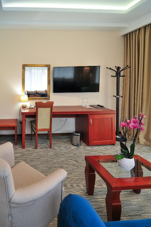 TV i/ili multimedijalni sistem u objektu Hotel Montenegrino