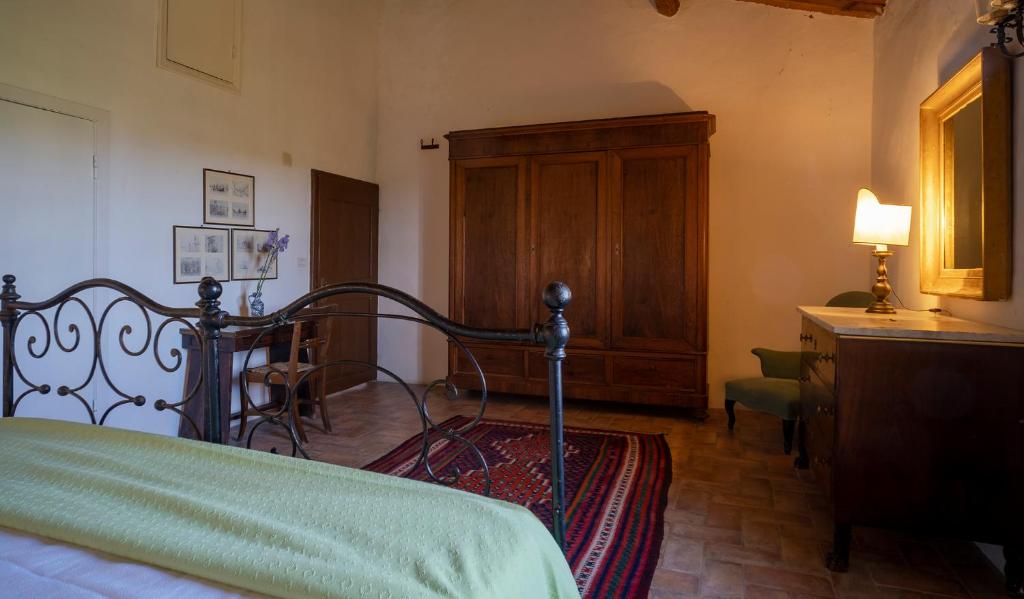 Postel nebo postele na pokoji v ubytování Castello del Calcione