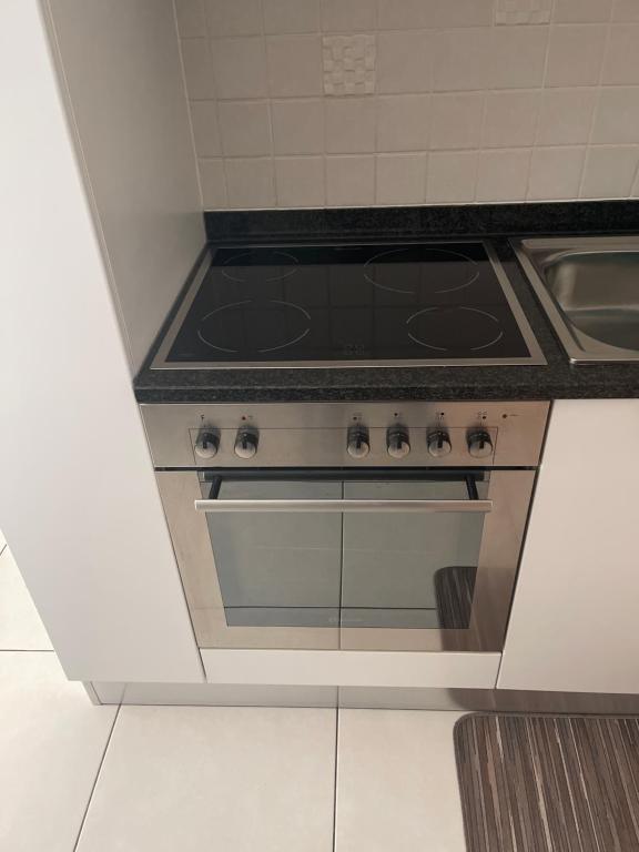 Kuchyň nebo kuchyňský kout v ubytování Appartamento vacanze Sanzen - Como Cernobbio Lugano