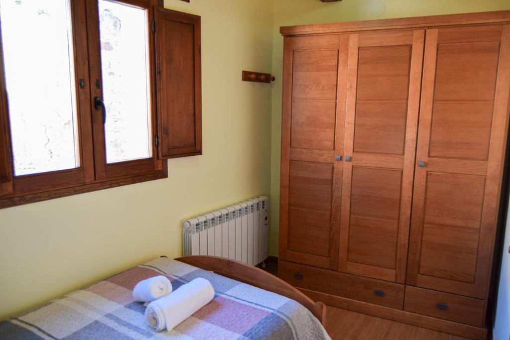 Postel nebo postele na pokoji v ubytování Casa Rural Martín