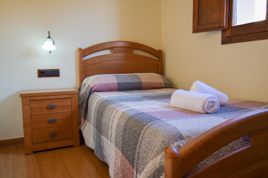 Postel nebo postele na pokoji v ubytování Casa Rural Martín