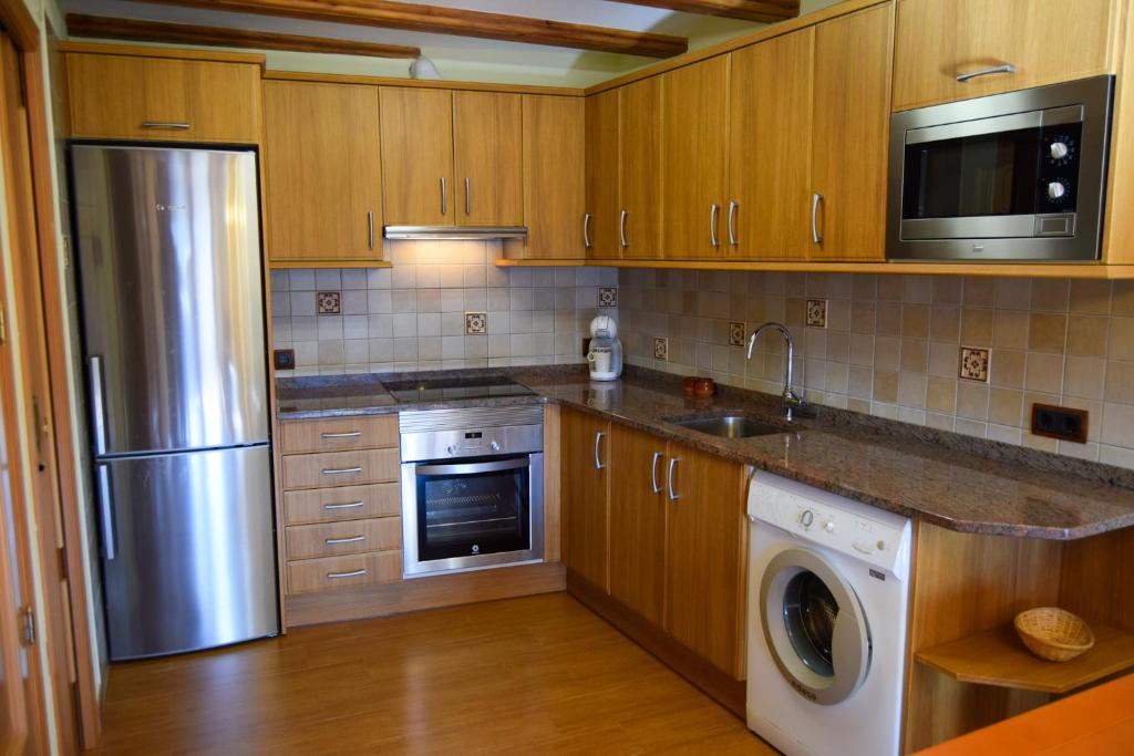 Kuchyň nebo kuchyňský kout v ubytování Casa Rural Martín