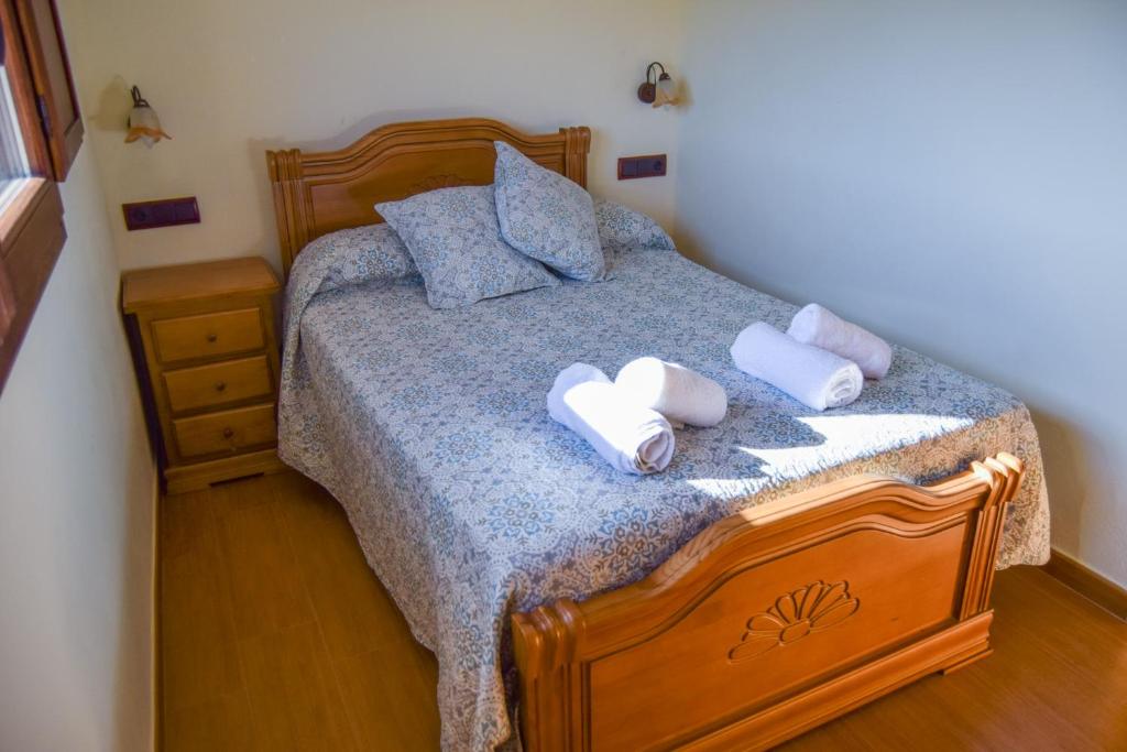 Postel nebo postele na pokoji v ubytování Casa Rural Martín