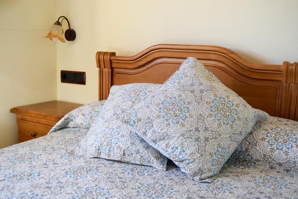 Postel nebo postele na pokoji v ubytování Casa Rural Martín