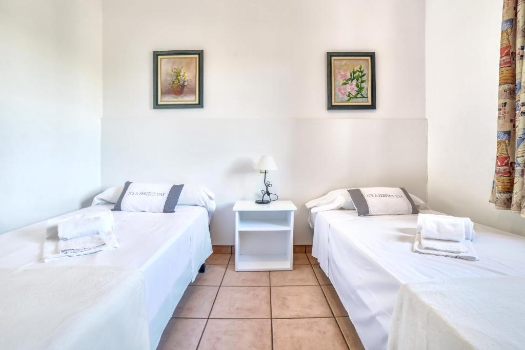 Postel nebo postele na pokoji v ubytování Villa Fuster - PlusHolidays