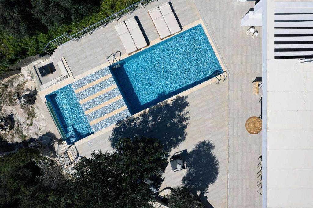 Bazén v ubytování Agapi Luxury Villa nebo v jeho okolí
