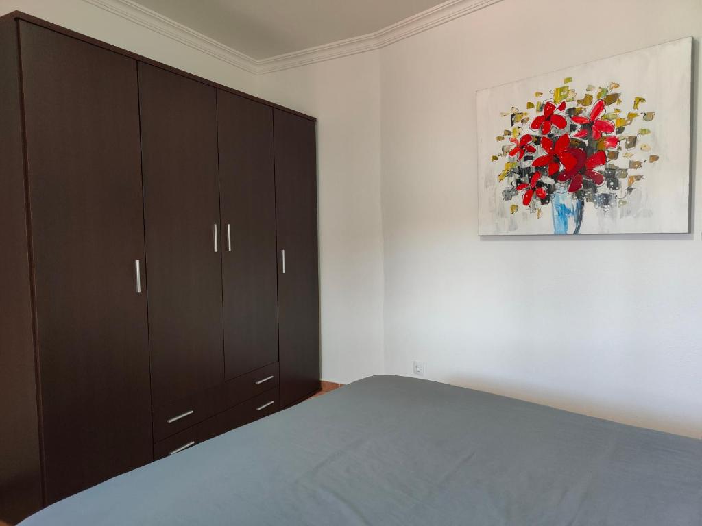 Posteľ alebo postele v izbe v ubytovaní Vivienda Vacacional La Portada