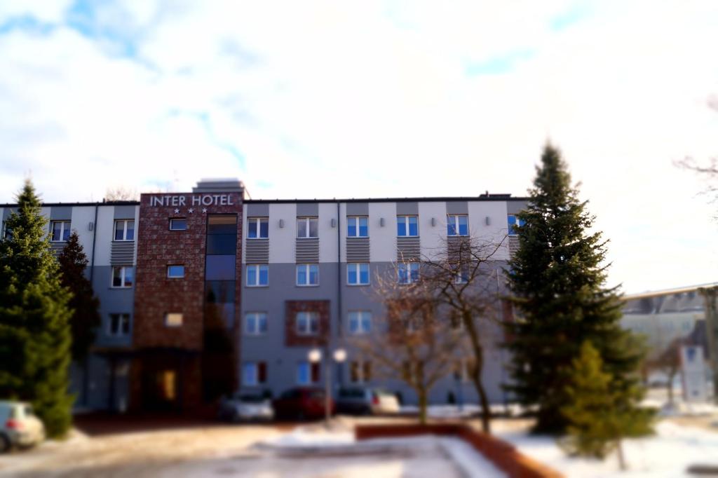 a building with a sign that reads inner hotel at Inter Hotel in Ostrołęka