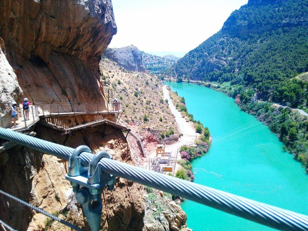 a view of a river from a suspension bridge at Hostel Rural Gaitanes, Caminito del Rey, Ardales in Ardales
