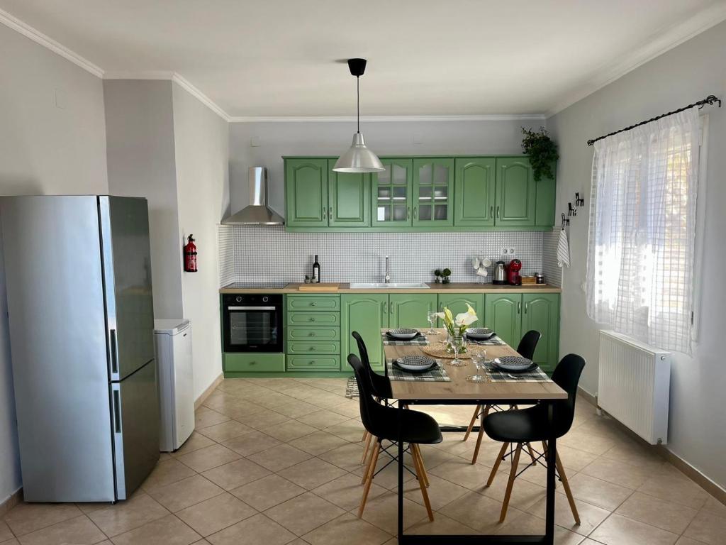 Kuchyň nebo kuchyňský kout v ubytování Coralli Pentati 1 "Dimitris Apartments"