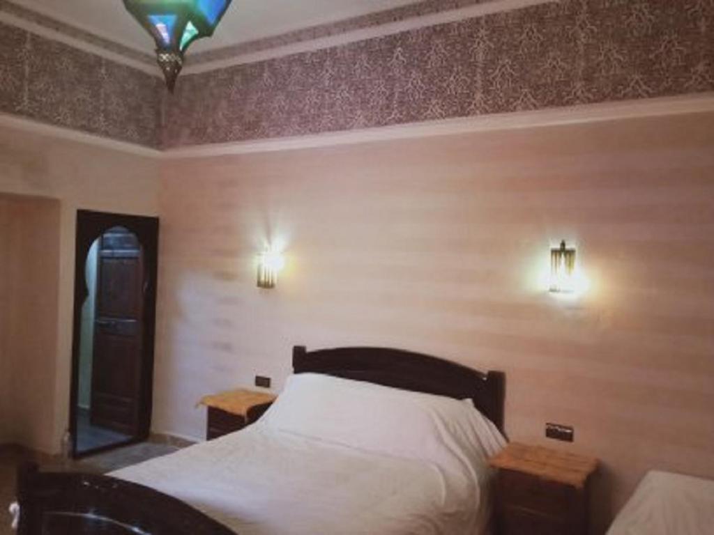 Postel nebo postele na pokoji v ubytování Riad Sidi Hicham