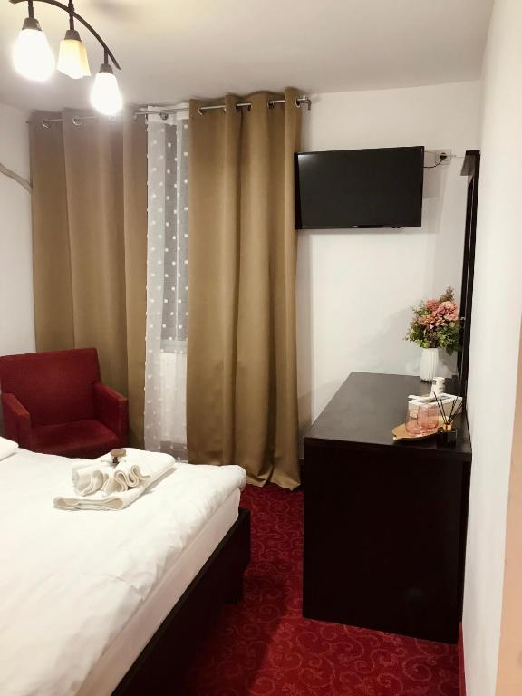 Postel nebo postele na pokoji v ubytování Apartamente 9 - Naomi