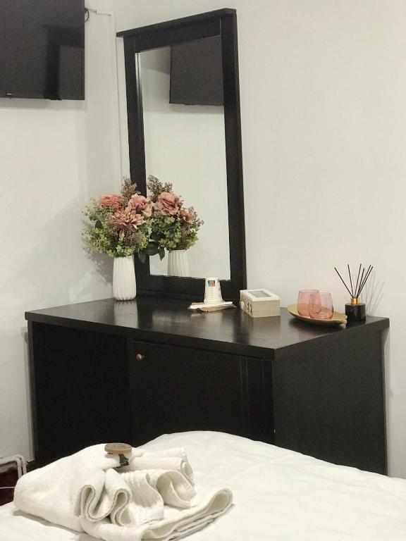 Postel nebo postele na pokoji v ubytování Apartamente 9 - Naomi
