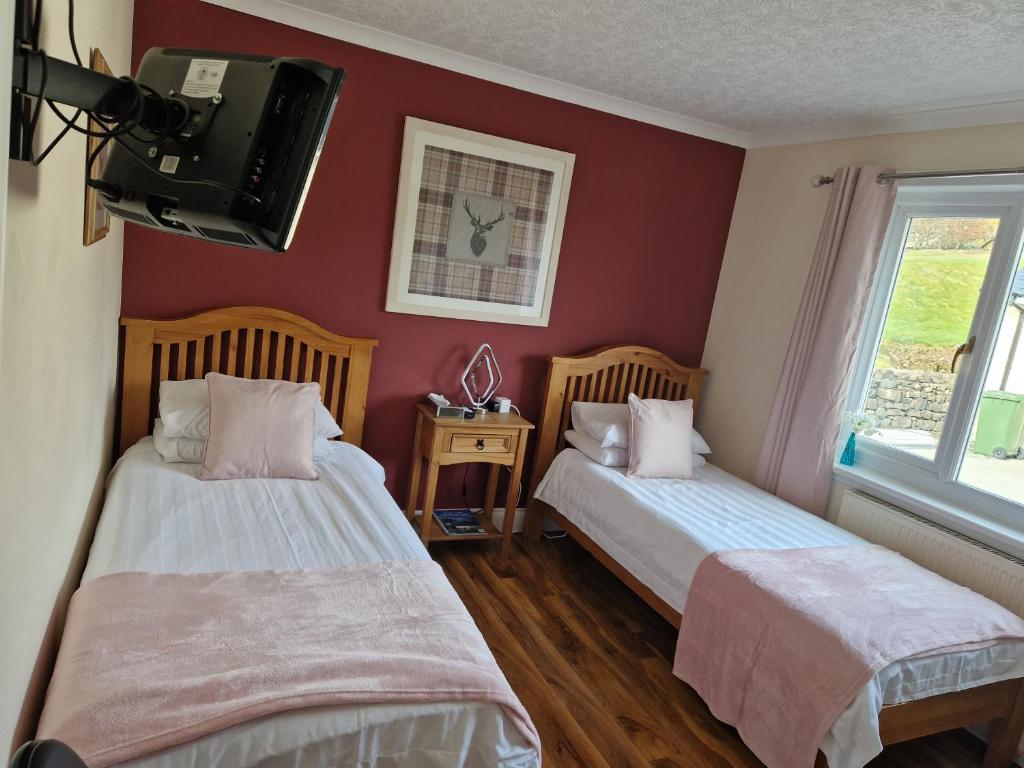 Postel nebo postele na pokoji v ubytování Skeabostview B&B