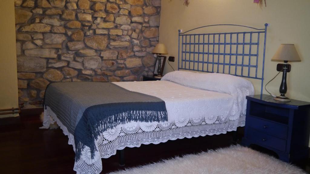 Postel nebo postele na pokoji v ubytování Casa Rural Garro