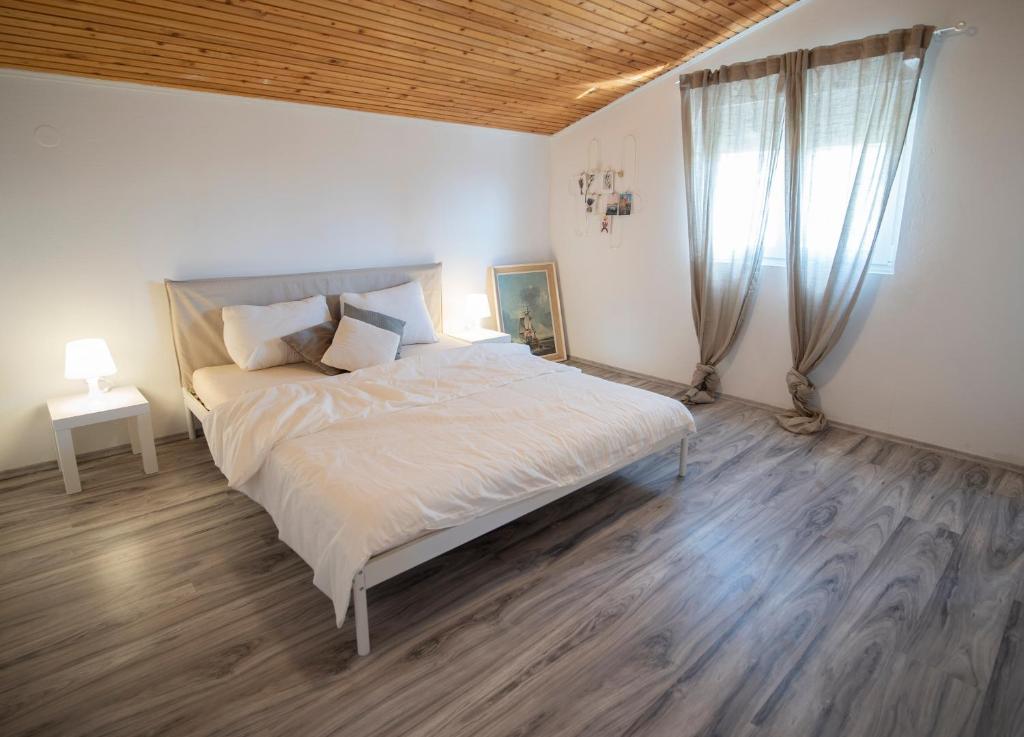 Postel nebo postele na pokoji v ubytování Ivano & Franko apartments