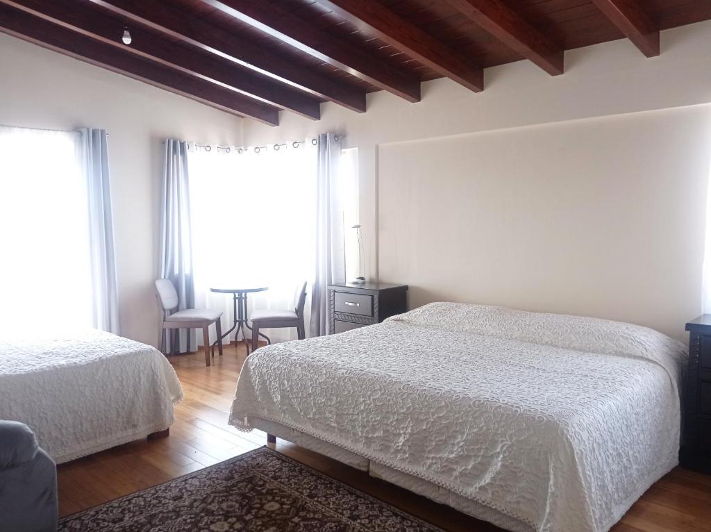 Postel nebo postele na pokoji v ubytování Posada Antiguo Camino Real