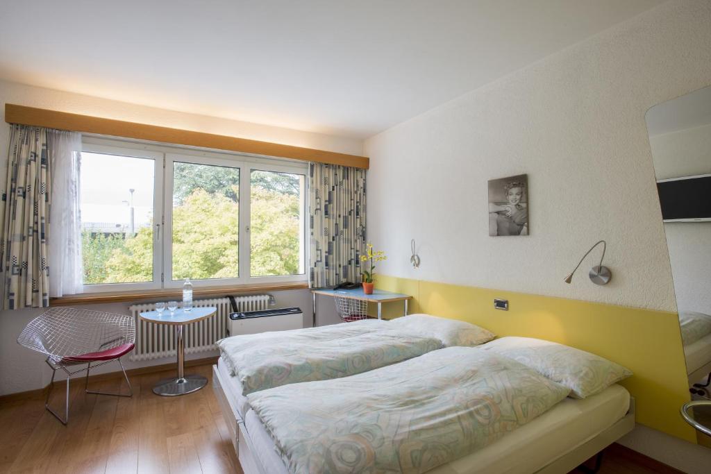 Postel nebo postele na pokoji v ubytování Hotel Vezia
