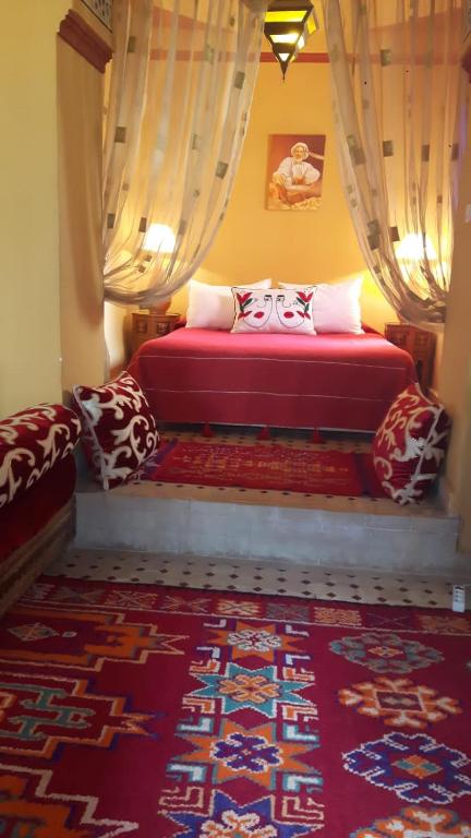 Postel nebo postele na pokoji v ubytování Riad Dar Colline