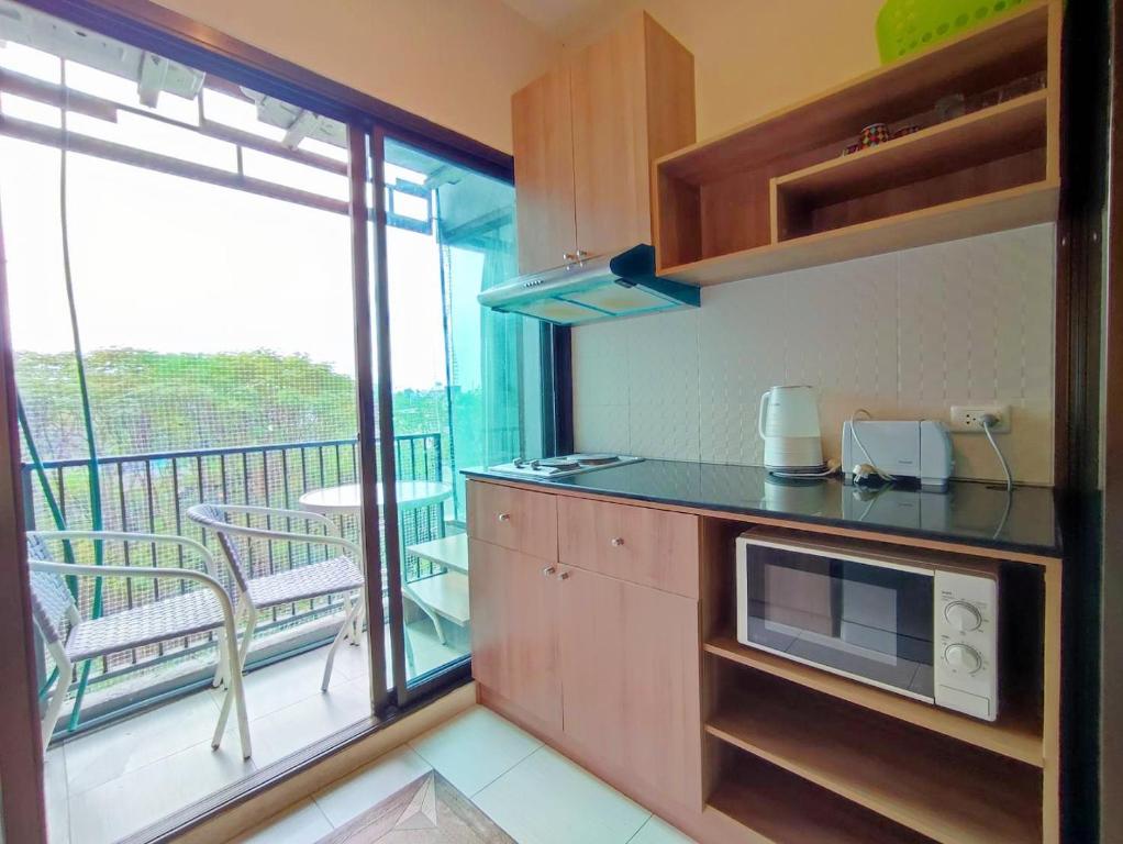 Deluxe Room at Tree Boutique Condo by Suwan Style Agency - Resim 20