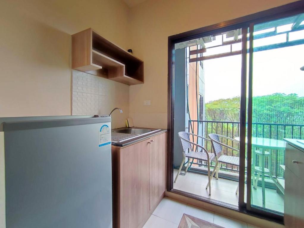 Deluxe Room at Tree Boutique Condo by Suwan Style Agency - Resim 19