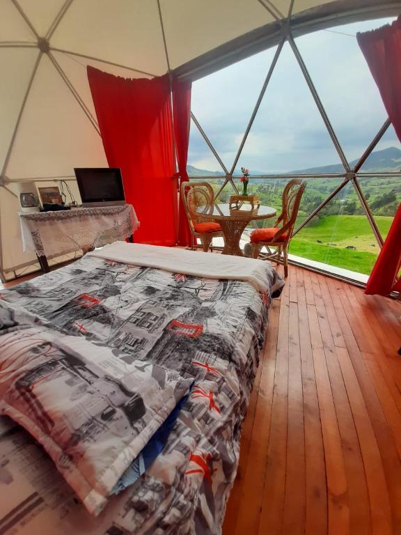 Postel nebo postele na pokoji v ubytování Glamping Mi Casita