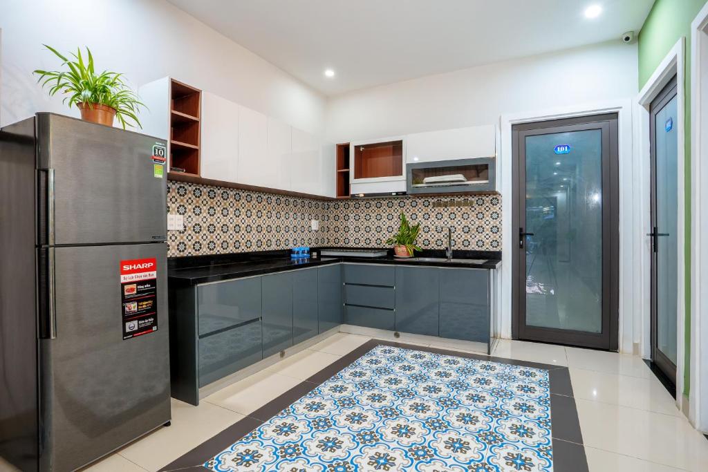 Kuchyň nebo kuchyňský kout v ubytování HAI DAO HOI AN VILLA