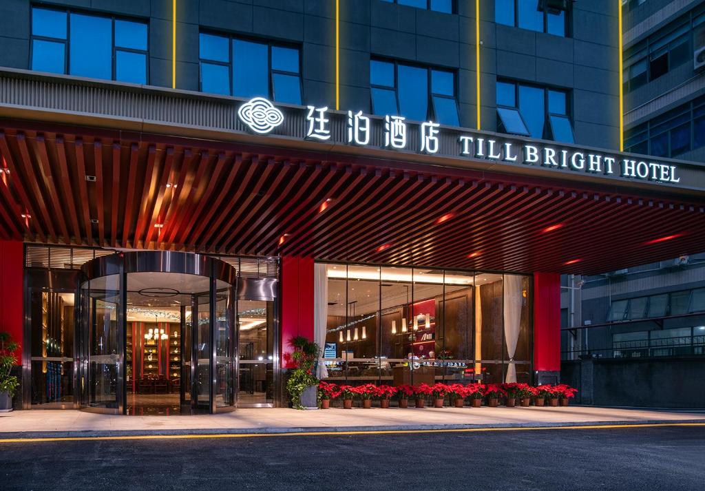 a facade of a building with a hotel at Till Bright Hotel, Shenzhen Baoan Airport in Bao'an