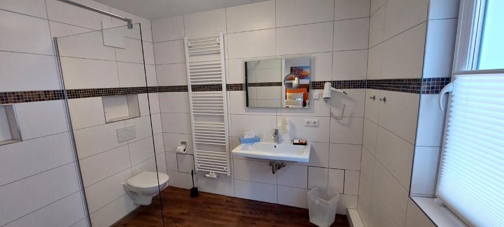 Koupelna v ubytování Hotel Amber Altstadt