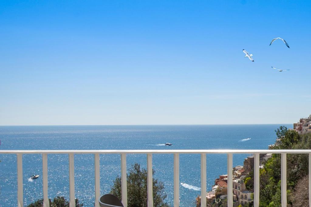 a view of the ocean from a balcony at Casa Carmela in Positano