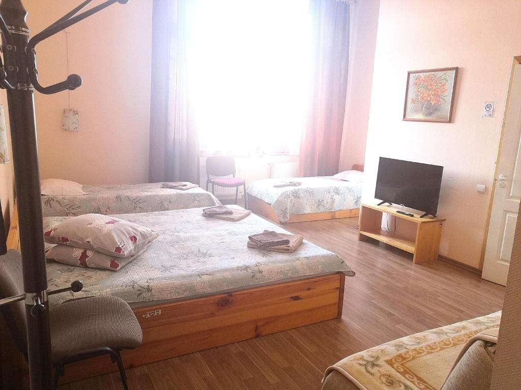 Postel nebo postele na pokoji v ubytování Hotel Ludza