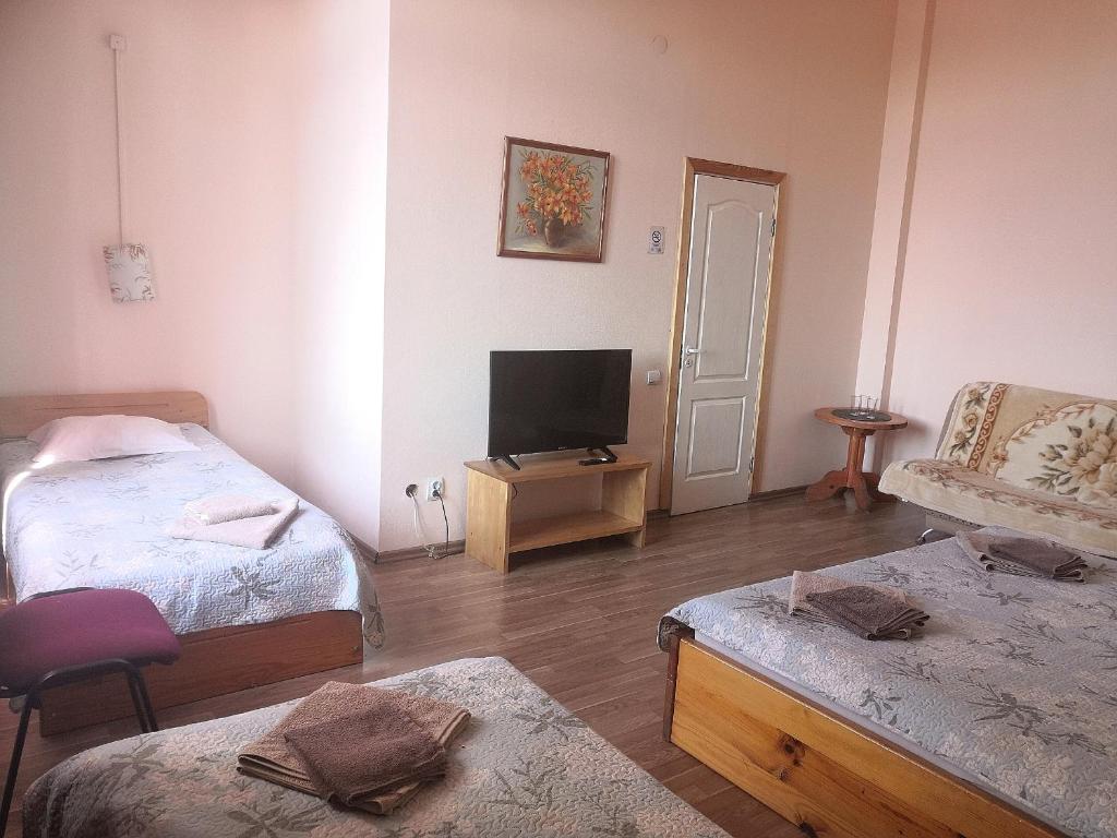 Postel nebo postele na pokoji v ubytování Hotel Ludza