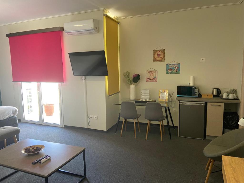 Kuchyň nebo kuchyňský kout v ubytování Connect Suites