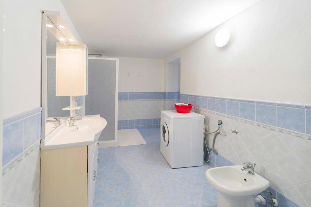 Kúpeľňa v ubytovaní CASA VACANZA IL PORTICO