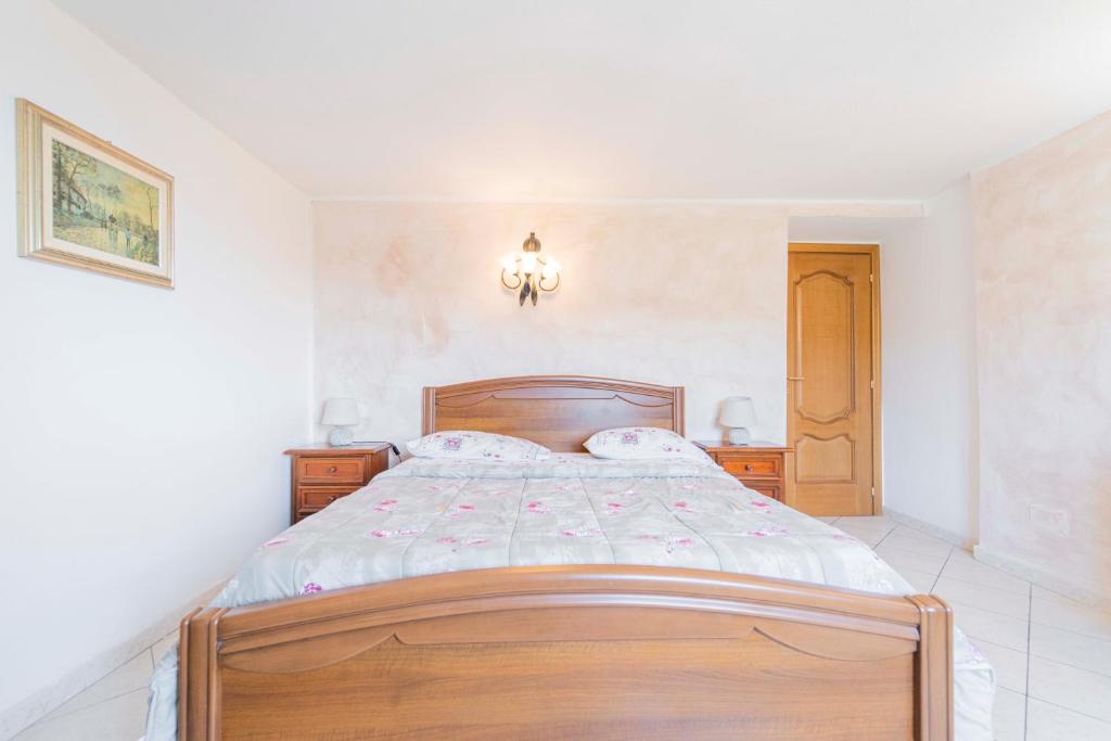 Posteľ alebo postele v izbe v ubytovaní CASA VACANZA IL PORTICO