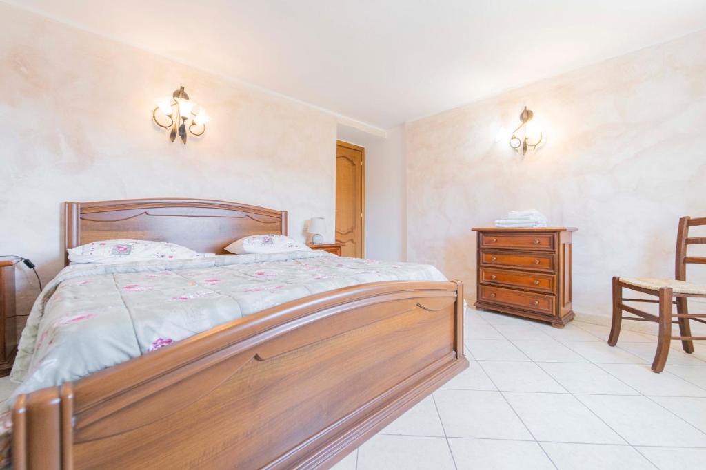 Posteľ alebo postele v izbe v ubytovaní CASA VACANZA IL PORTICO