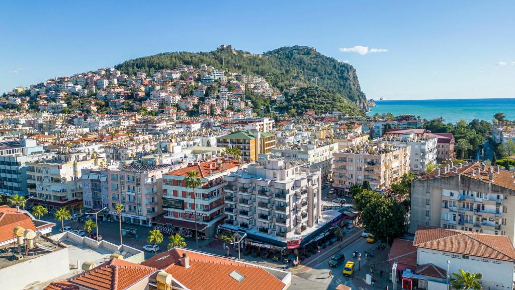 an aerial view of a city with buildings at Aslan Corner Hotel in Alanya