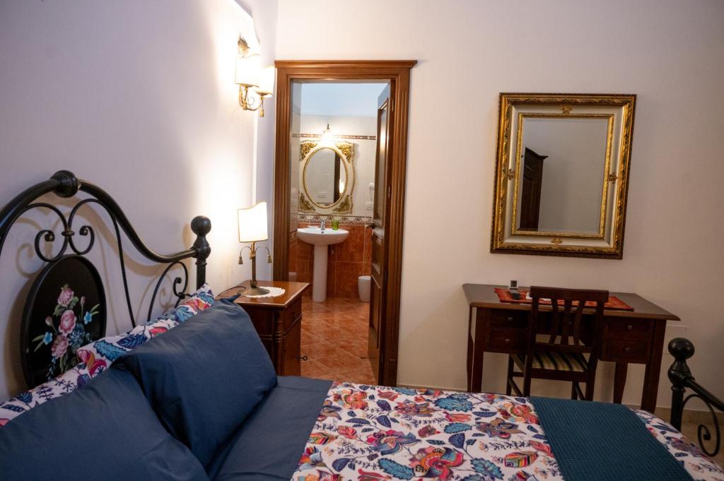 Postel nebo postele na pokoji v ubytování Corcioli B&B