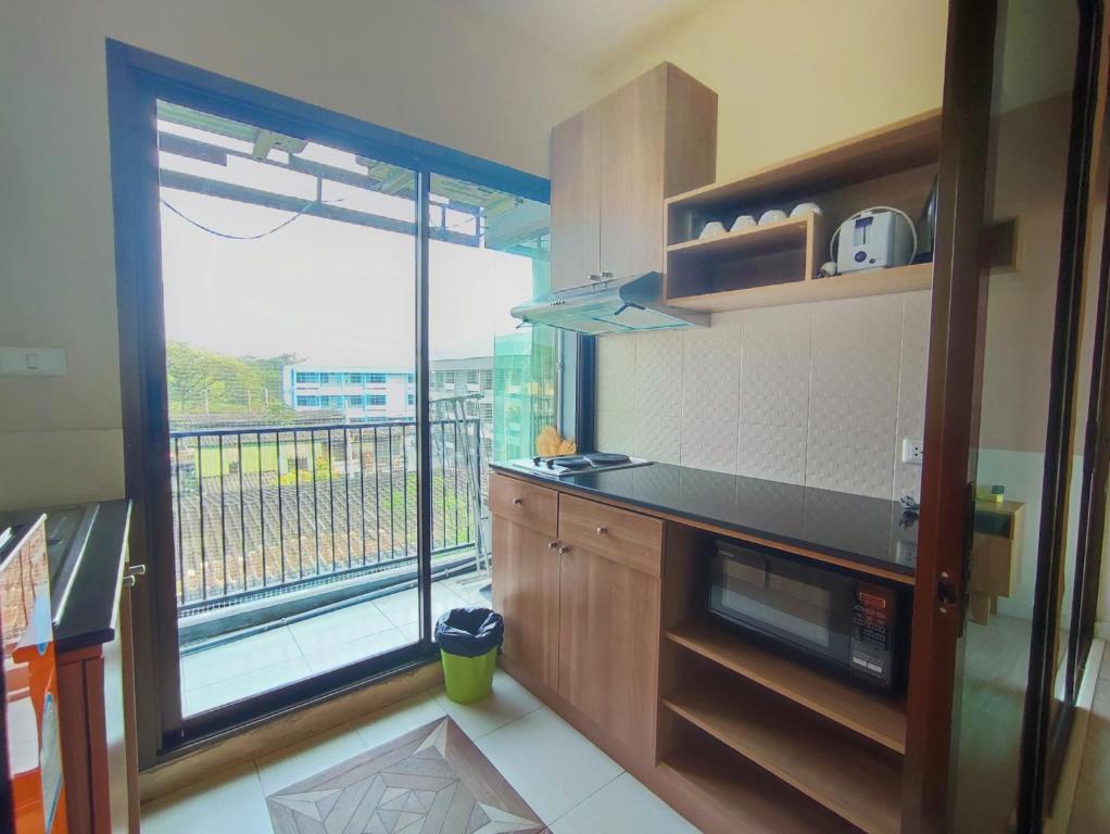 Deluxe Room at Tree Boutique Condo by Suwan Style Agency - Resim 24