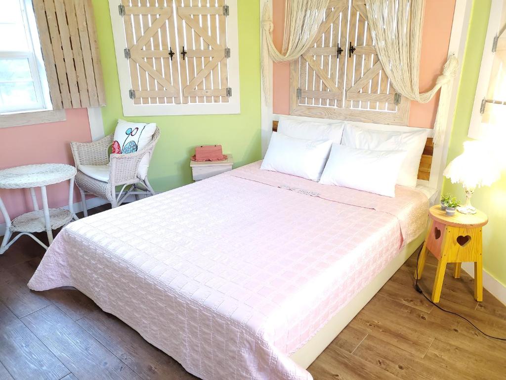 Postel nebo postele na pokoji v ubytování Olive Vanilla Pension