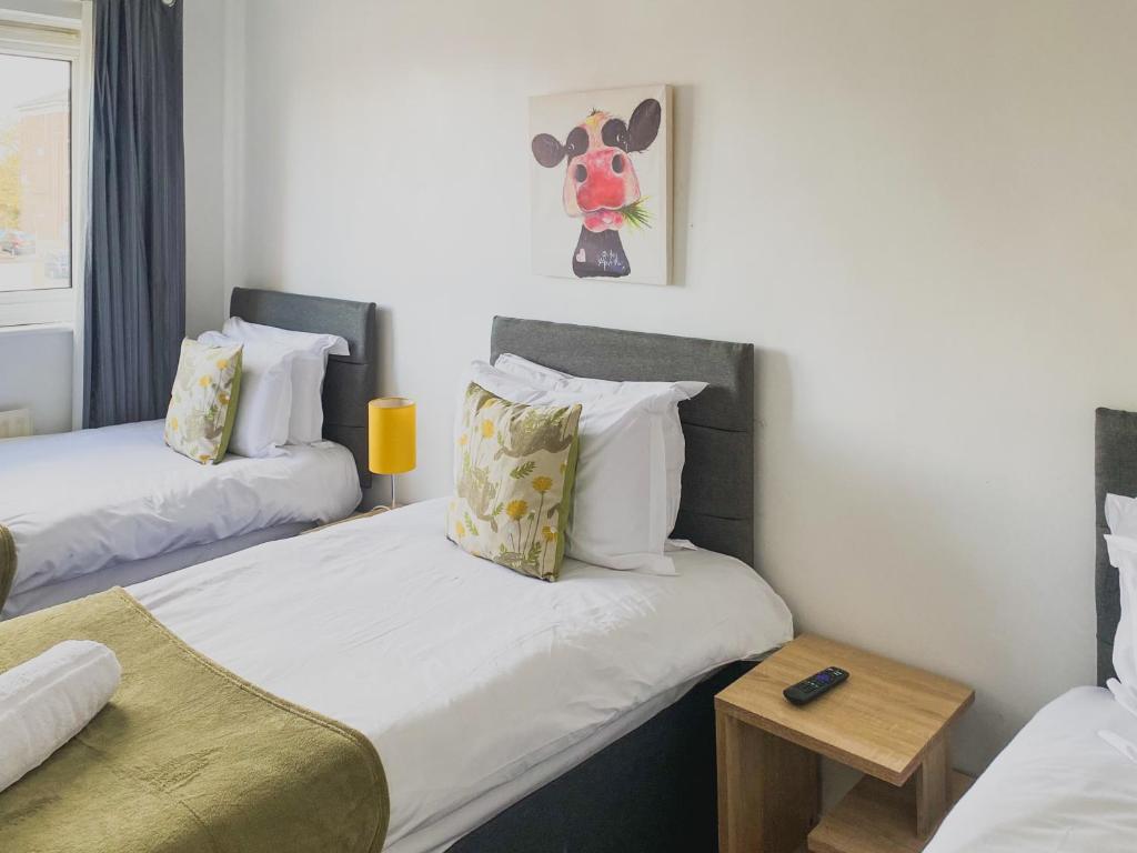 Ένα ή περισσότερα κρεβάτια σε δωμάτιο στο 3 Bedroom flat in Hockley Birmingham near city centre, comfy and convenient